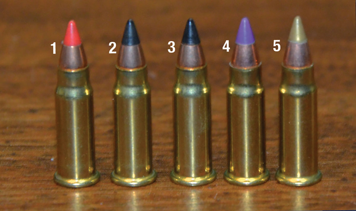V-MAX 17-grain bullets, made by Hornady for various companies, have polymer tips of different colorations. The color is the same for bullets in Federal and CCI ammunition, but the headstamps on their cases differ. Cartridges shown include: (1) Hornady, (2) Federal, (3) CCI, (4) Eley and (5) Remington.